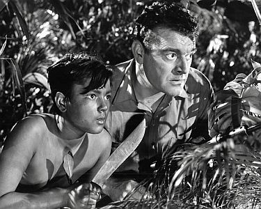 "Weiße Frau im Dschungel"4) (1952, "The Planters Wife"): Szenenfoto mit Jack Hawkins als Kautschukpflanzer Jim Frazer; mit freundlicher Genehmigung von Pidax-Film, welche das Abenteuer am 09.04.2021 auf DVD herausbrachte.