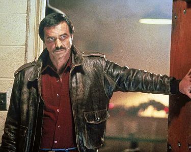 "HeatNick, Der Killer": Szenenfoto mit Burt Reynolds als Nick Escalante; mit freundlicher Genehmigung von Pidax-Film, welche den Action-Thriller Ende Juli 2022 auf DVD herausbrachte.