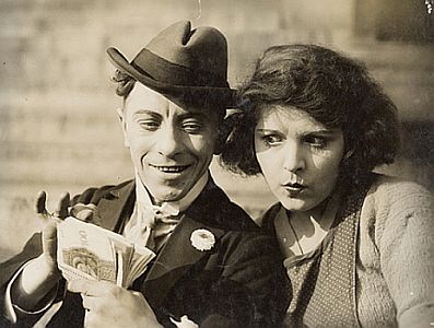 Lichtbild mit Gerhard Ritterband und Colette Brettel aus dem Stummfilm "Das Haus am Krgel" (1927); Regie: Ernst Winar1); Quelle: cyranos.ch; Lizenz: gemeinfrei
