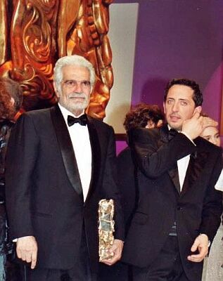 Omar Sharif und Gad Elmaleh anlässlich der Csar-Verleihung 2005; Quelle: Wikimedia Commons; Urheber: Georges Biard; Lizenz CC-BY-SA 3.0.