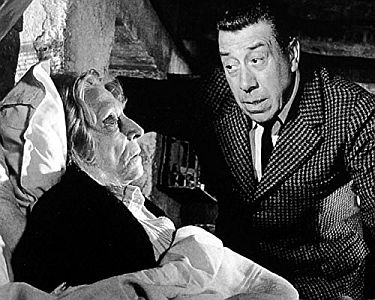 "Der Teufel und die zehn Gebote": Szenenfoto mit Fernandel als "Gott" und Germaine Kerjean (18931975) als Gromutter Mimi; mit freundlicher Genehmigung von Pidax Film, welche die Produktion Ende Januar 2017 auf DVD herausbrachte.
