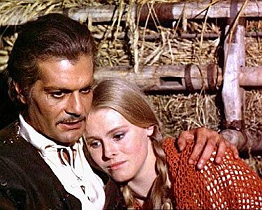 "Das vergessene Tal": Szenenfoto mit Omar Sharif als Lehrer Vogel und Florinda Bolkan als Erica Torfeld; mit freundlicher Genehmigung von Pidax-Film, welche das Abenteuer am 20.12.2019 auf DVD herausbrachte.