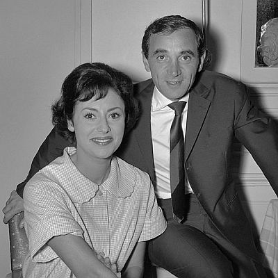 Charles Aznavour und Caterina Valente am 30. September 1961 bei der "Grand Gala Du Disque" im Kurhaus von Scheveningen; Rechteinhaber: Nationaal Archief (Den Haag, Rijksfotoarchief; Bestandsnummer: 912-9919); Urheber/Fotograf: Joop van Bilsen / Anefo; ; Quelle: Wikimedia Commons; Lizenz:www.gahetna.nl/over-ons/open-data / CC BY-SA 3.0 NL